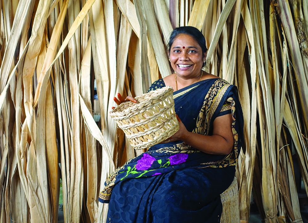 AMI testimonial: a woman holding a woven basket